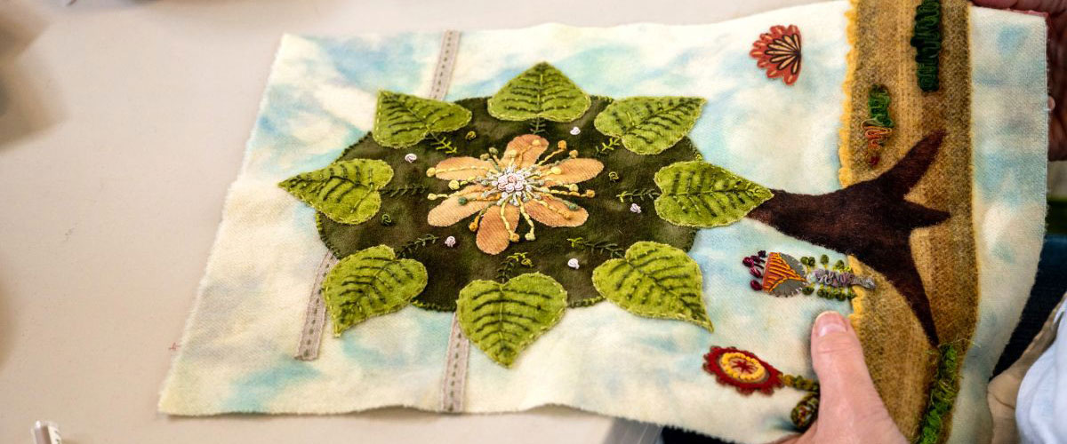 Embroidered fabric art in progress at Sue Spargo workshop