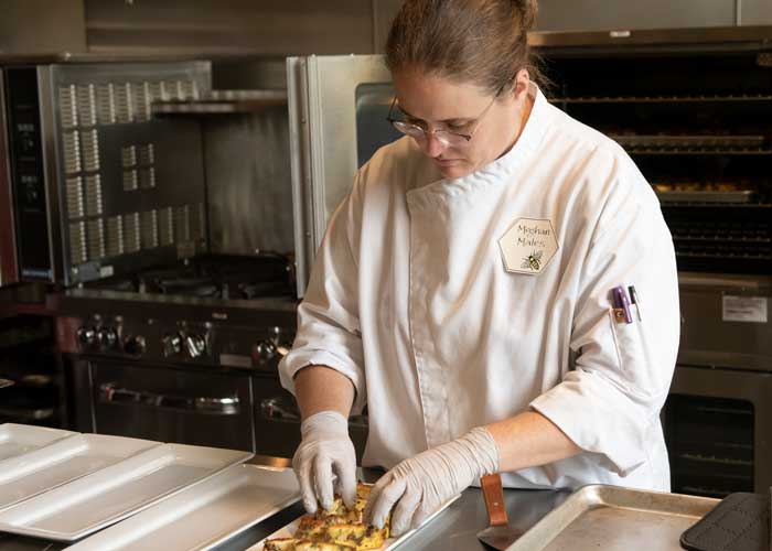 Kitchen-Event-2019 Person working in BARN's commercial kitchen