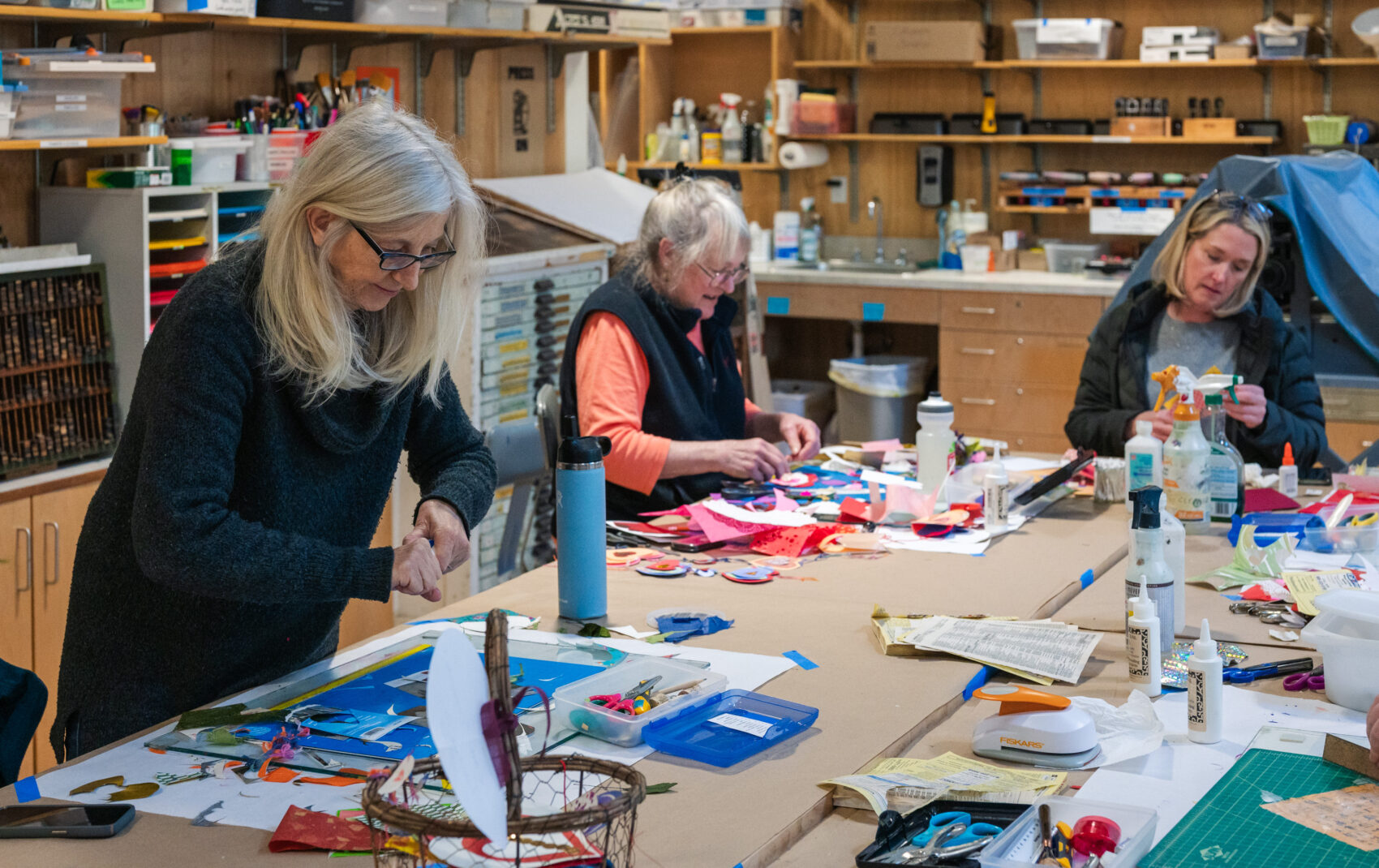 Volunteers making Valentines Day cards in the Print & Book Studio