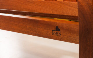 BARN logo on library bench bult by BARN woodworkers