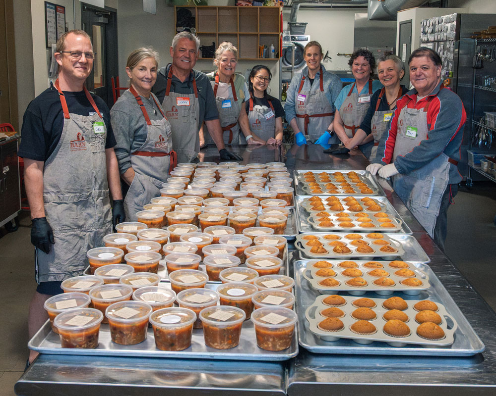 Volunteers cooked and packaged dozens of gallons of minestrone soup and dozens of banana muffins for area food banks in April.